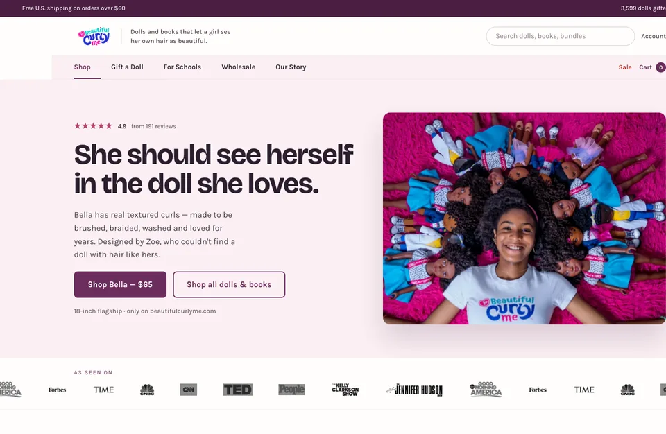 Homepage direction A in plum and pink: the headline "She should see herself in the doll she loves" beside the 18-inch doll, with a star rating, two buttons and a press logo row